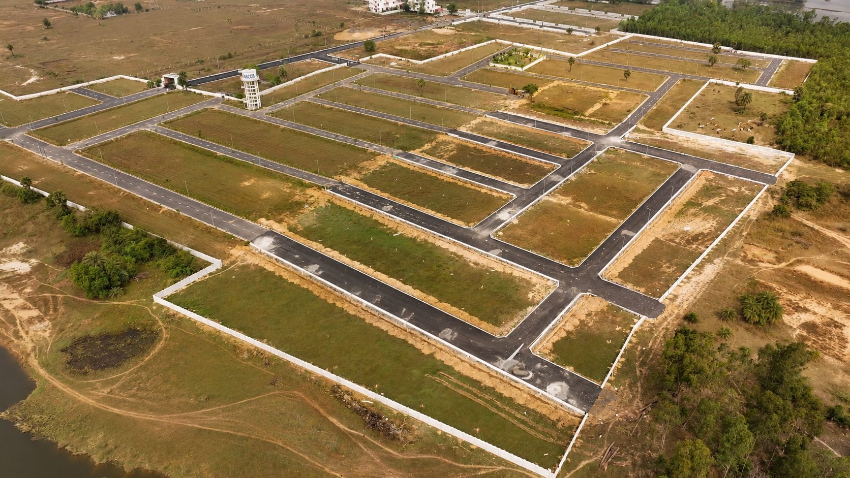 Roads, compound wall and plots as they stand